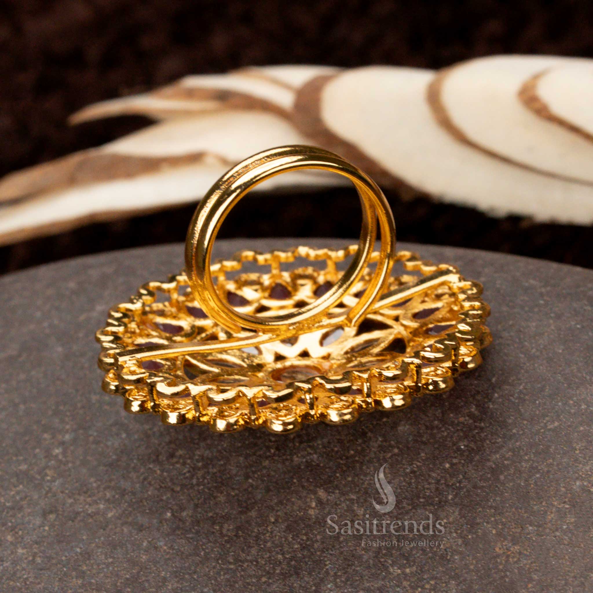 Elegant antique gold ring with a detailed floral pattern and sparkling stones - Sasitrends