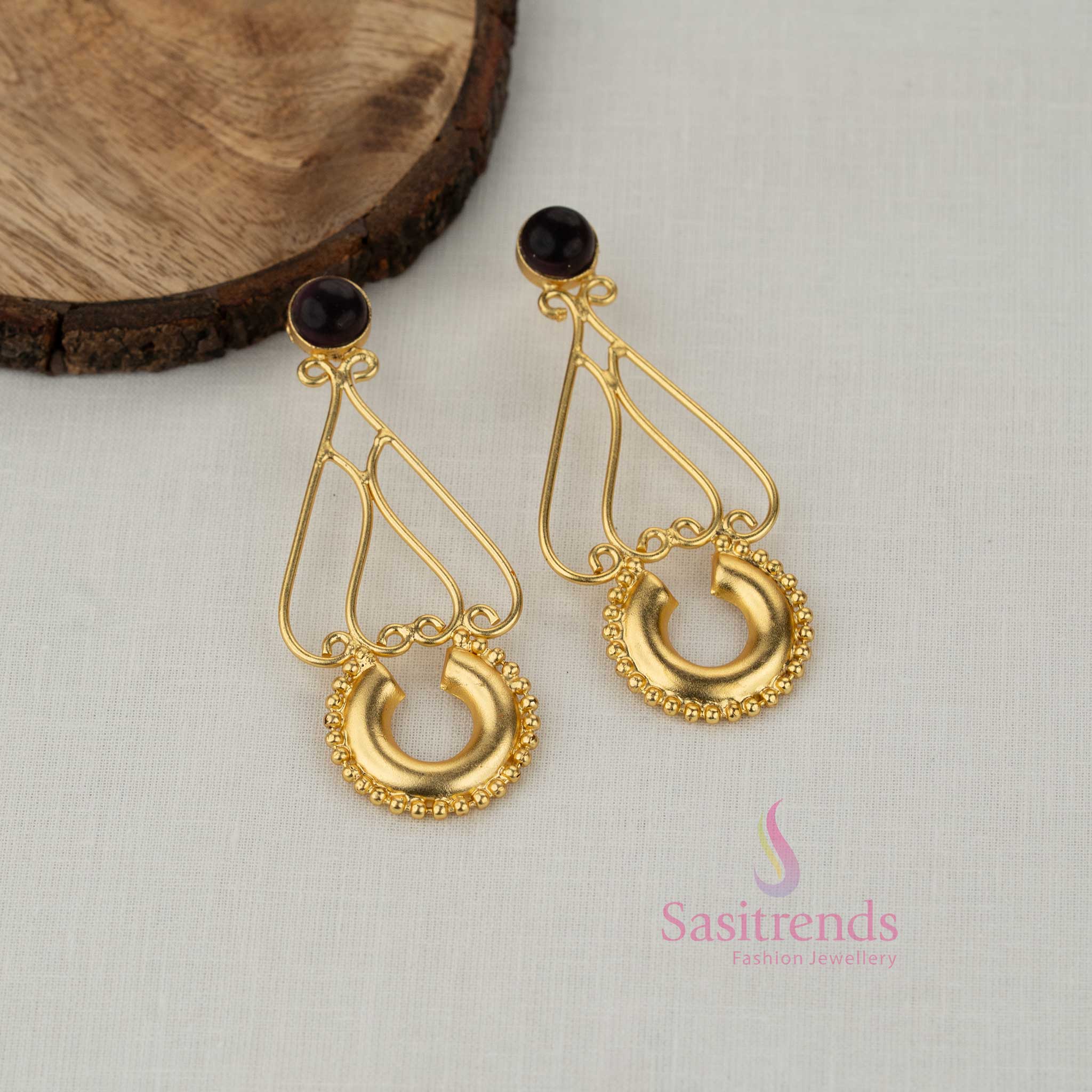 Sasitrends party wear gold plated frame earrings with maroon stone stud and decorative drop design
