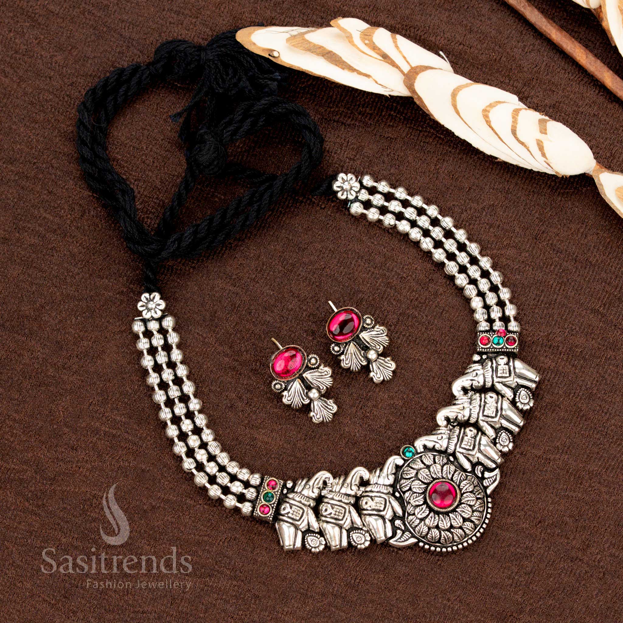 Stunning antique-finish oxidised necklace jewellery set featuring a statement pendant with layered beads and matching earrings in an elegant bohemian design - Sasitrends