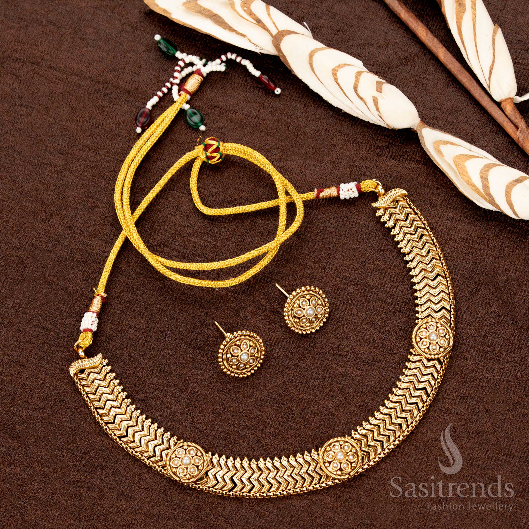 Exquisite antique gold necklace set featuring white AD stone round floral motifs, a stunning traditional jewellery piece for weddings and celebrations - Sasitrends