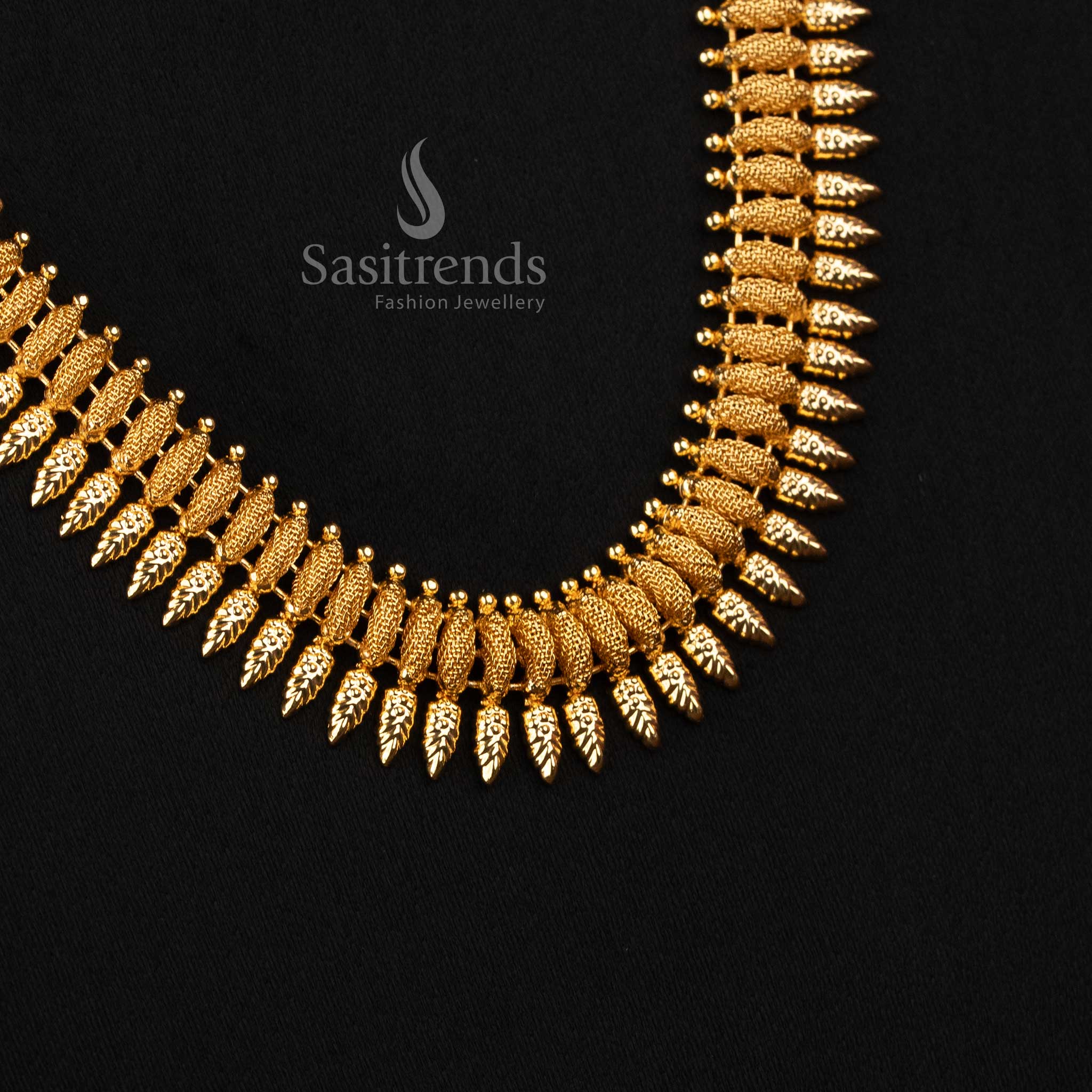 Elegant long traditional micro gold plated necklace with continuous linked leaf segments and detailed structured formation in 1 gram gold look finish by Sasitrends