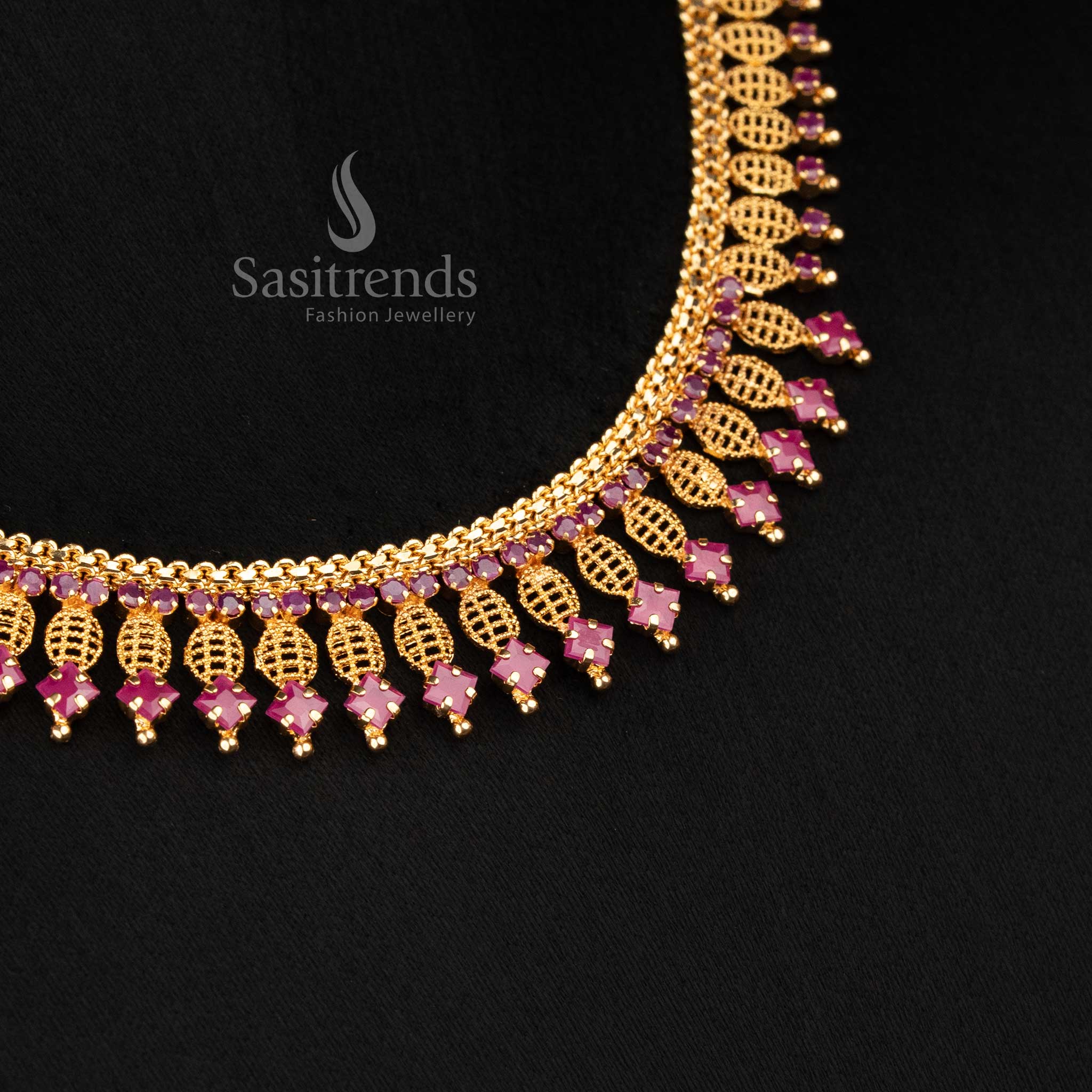 Elegant Micro gold plated ruby AD stone necklace with finely arranged leaf pattern structure and cascading hanging design crafted in 1 gram gold look finish by Sasitrends
