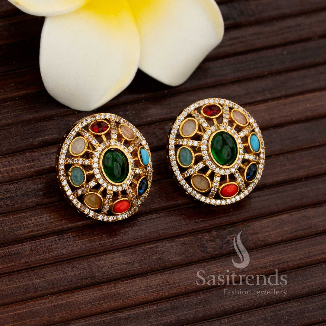 Radiant matte gold plated Navaratna dome stud earrings adorned with sparkling AD stone highlights, exuding luxury and charm for ethnic jewellery lovers – premium festive accessory by Sasitrends.