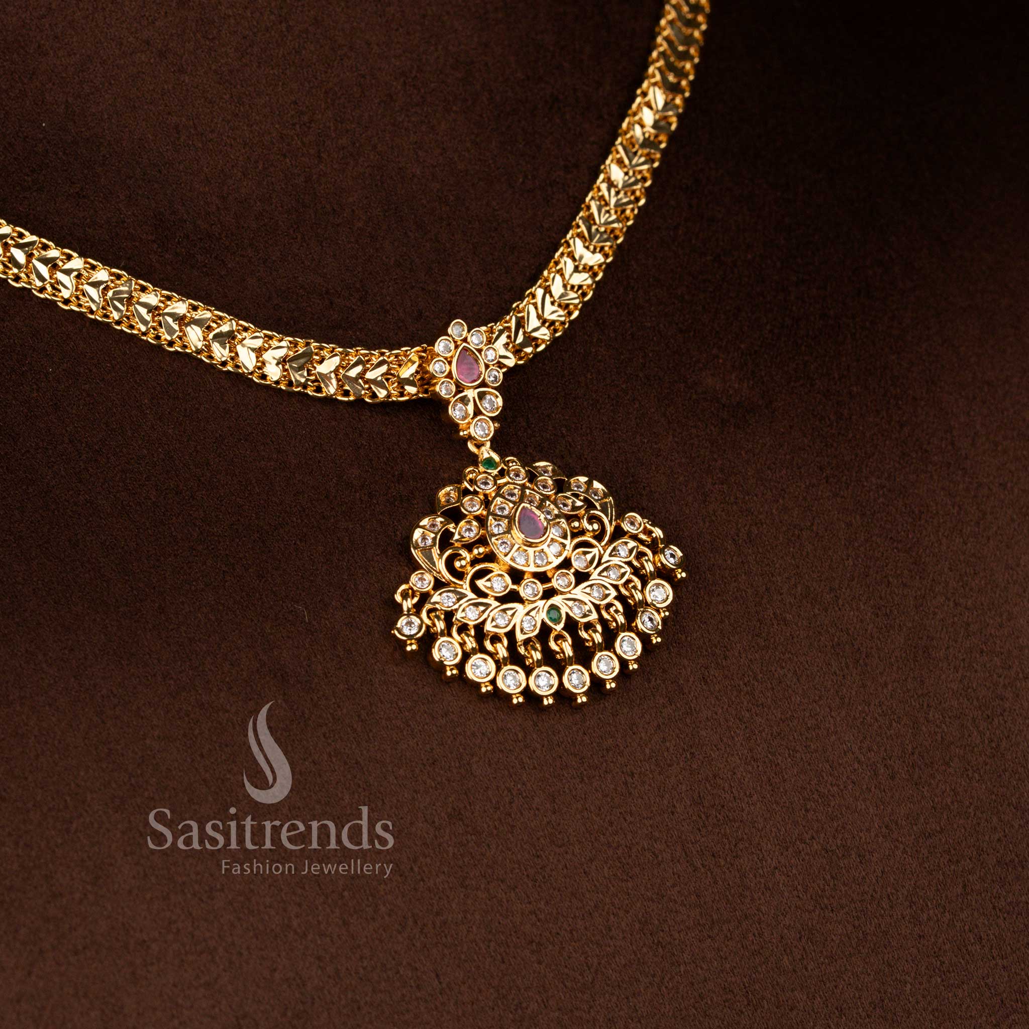 Traditional grand occasion wear impon addigai bridal wear micro gold plated white ruby green AD stone floral teardrop motif pendant necklace set - Sasitrends