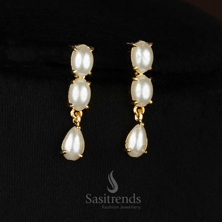 Party wear 24k micro gold plated american diamond pearl oval link teardrop dangler necklace set by Sasitrends