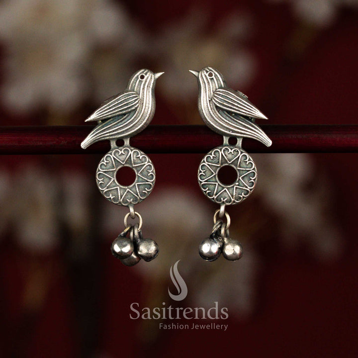 Artisan Sparrow Emblem Oxidised Silver Circular Heart Engraved Disc Earrings with Metallic Ghungroos for College Ethnic Wear
