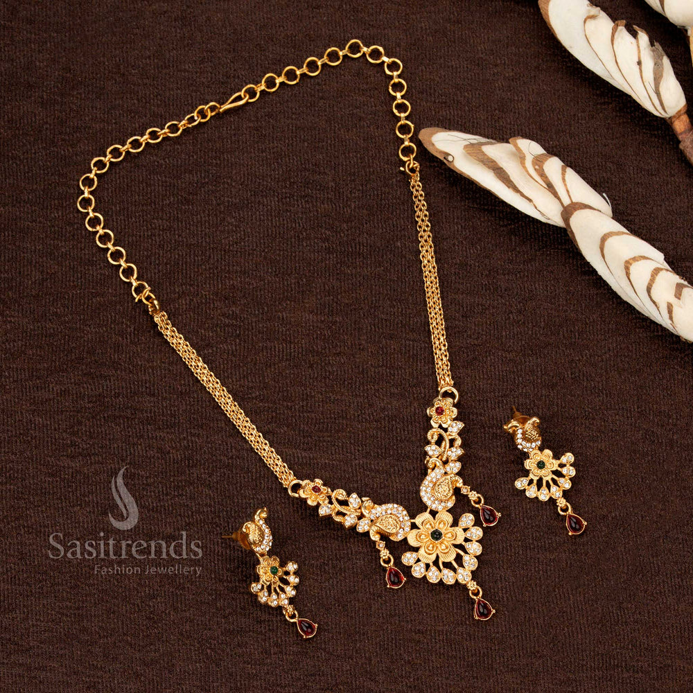 Luxurious matte gold temple jewellery with peacock motifs and hanging teardrop stones - Sasitrends
