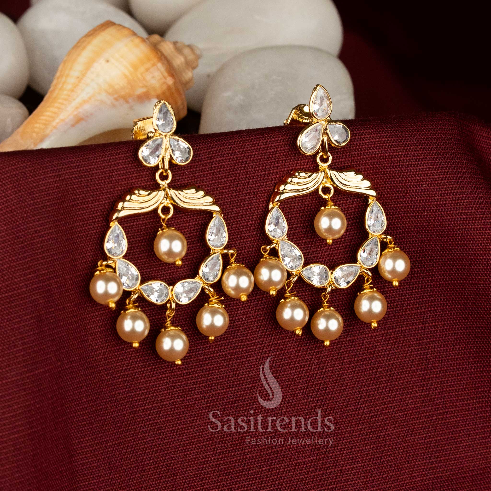 White three-lobe floral crescent earrings featuring shimmering Kundan and American Diamond artistry with graceful pearl accents for serene elegance in bridal and festive styling – Sasitrends