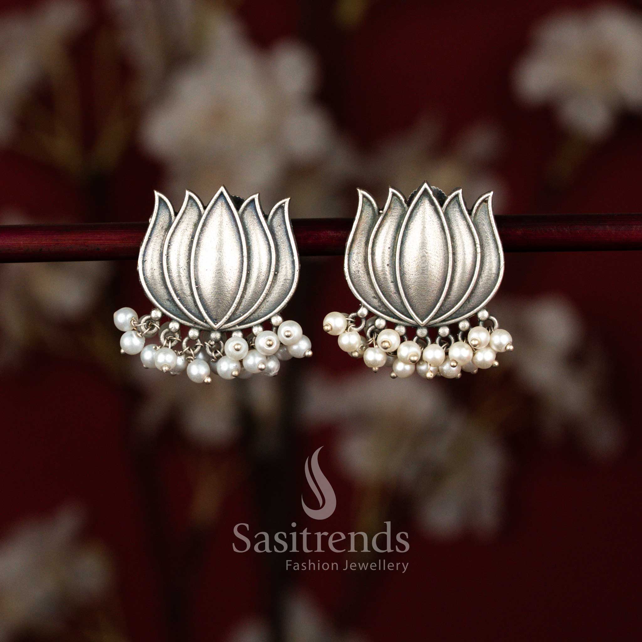 Oxidised silver lotus motif floral earrings with pearl hangings - Sasitrends