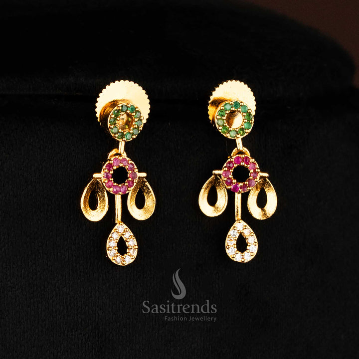 Handcrafted ethnic earrings set with floral artistry and teardrop elegance in a matte gold base, embellished with American diamond stones – classic Indian festive jewellery from Sasitrends