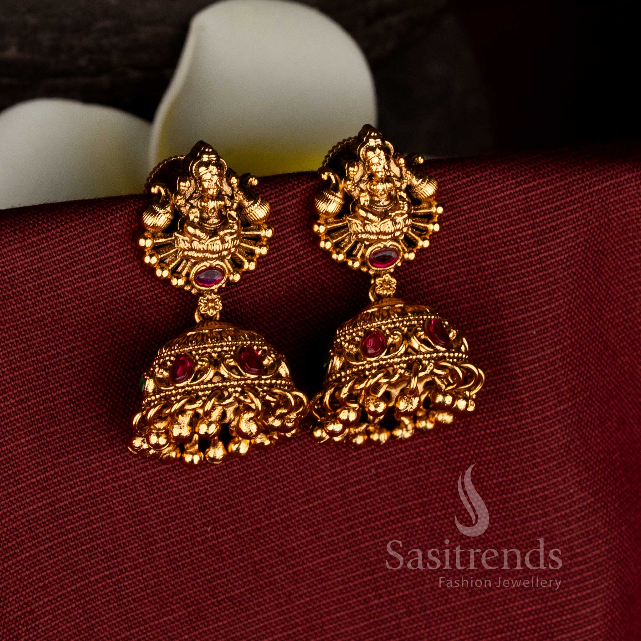 Premium matte gold plated temple dual peacock Goddess Lakshmi jhumka earrings with screw type back for ceremonial and festive wear-sasitrends
