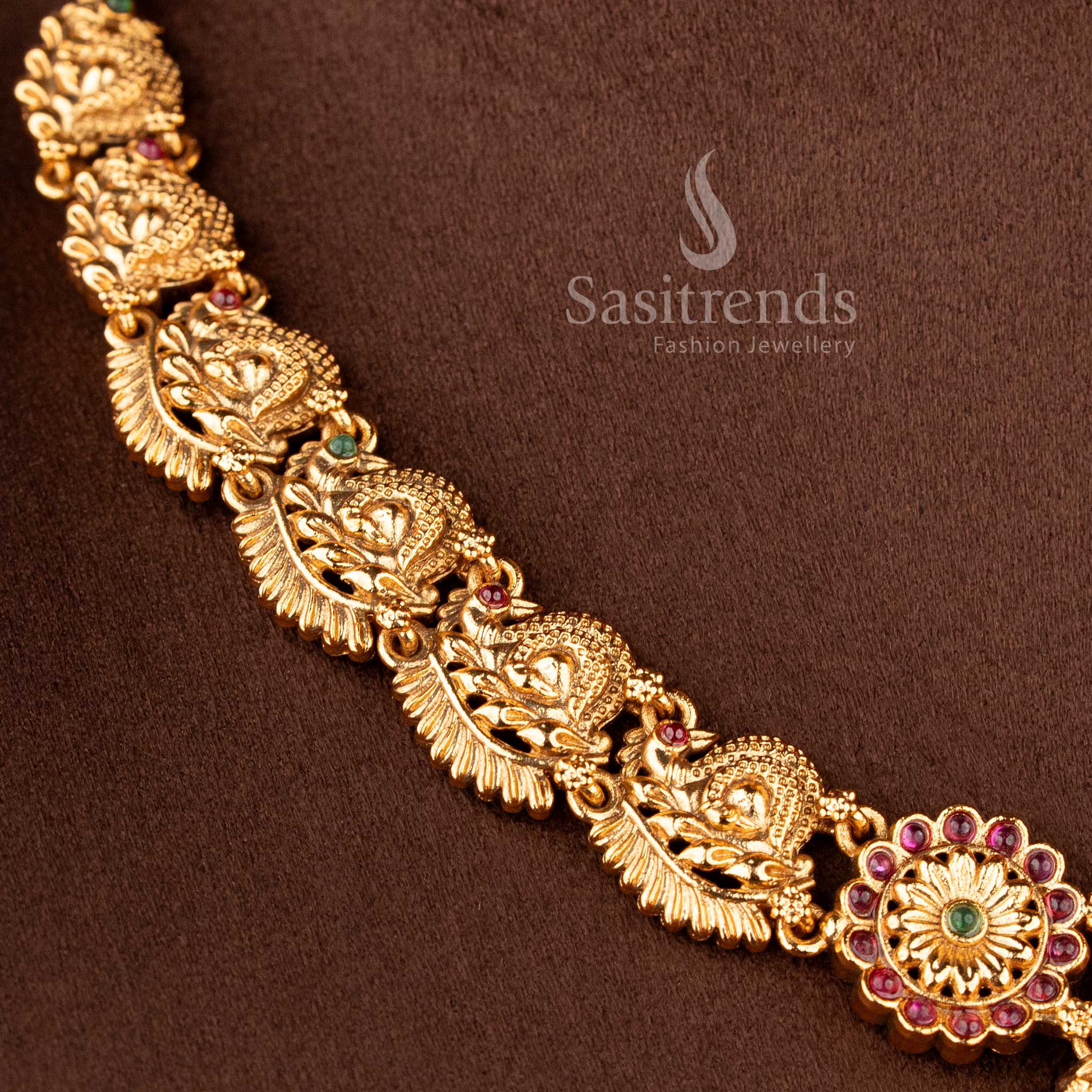 Grand bridal temple matte gold Nakshi style choker necklace with Lakshmi and peacock design, ruby green stones, perfect for lehenga, saree and festive wear