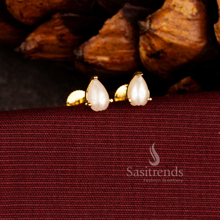 Exquisite micro gold plated teardrop stud earrings in pearl with temple-inspired motifs, perfect for weddings, festivals, and cultural celebrations – Sasitrends