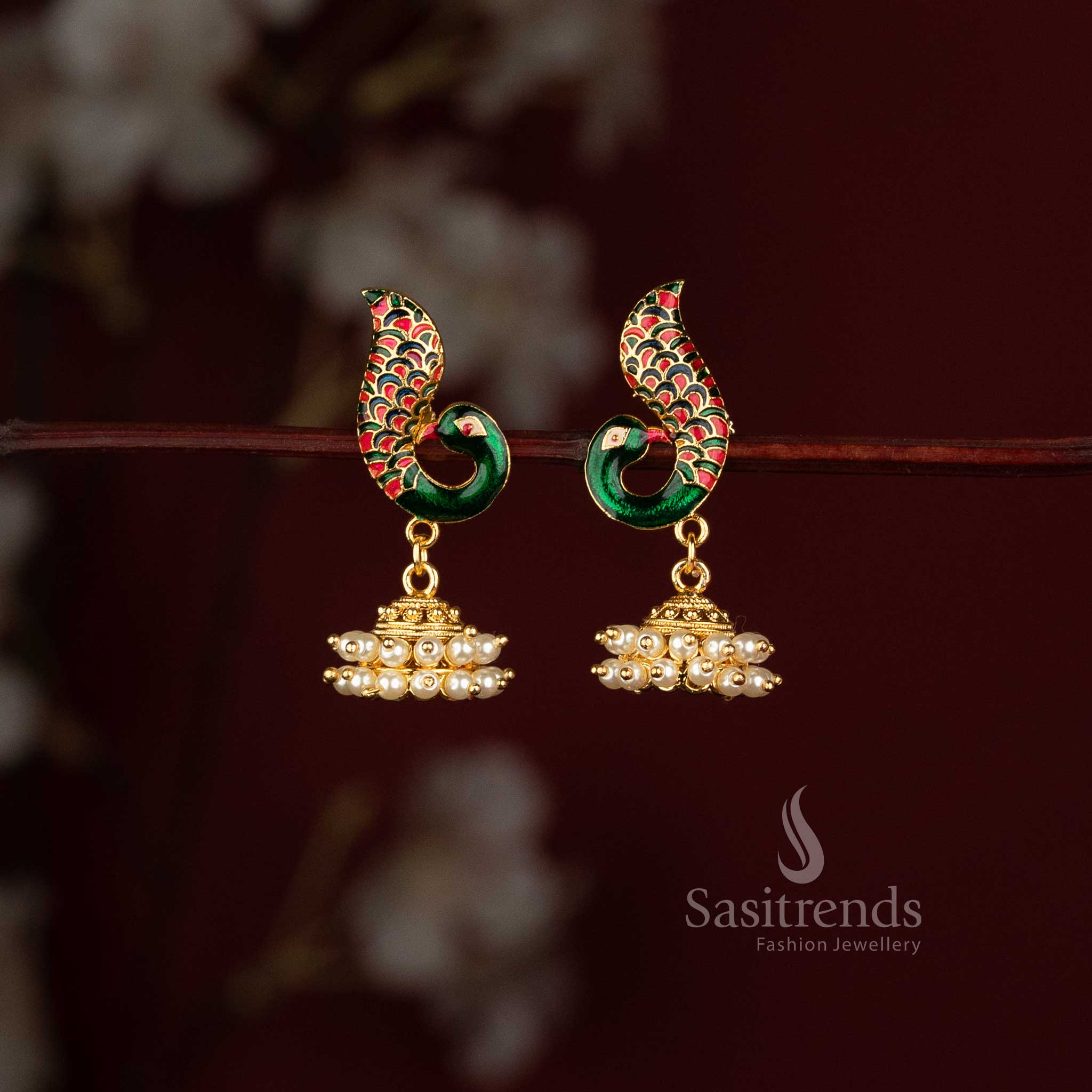 Sasitrends Micro Gold Plated peacock enamel jhumka earrings with green peacock motif and pearl dome 