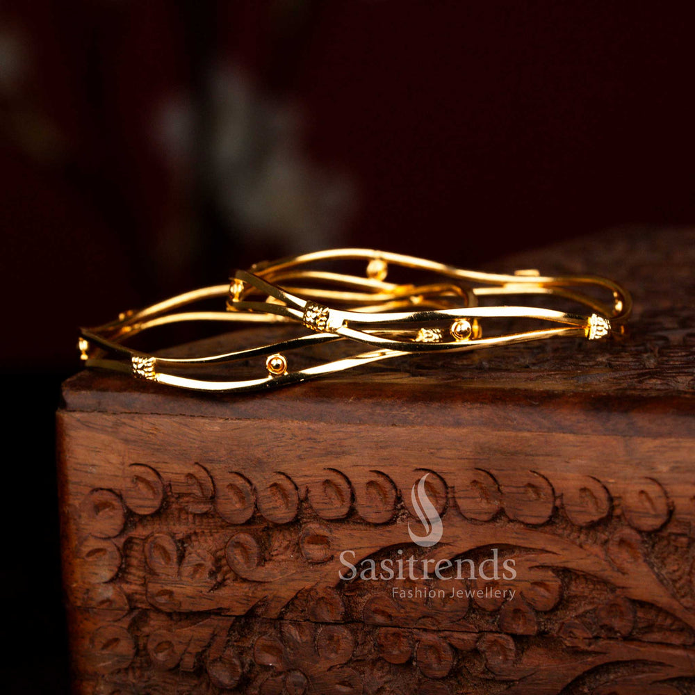 Graceful one gram micro gold plated pair of two wave zig-zag designer bangles crafted for festive traditional styling with guaranteed finish – Sasitrends