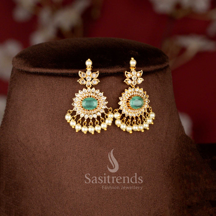 Luxurious Matte Gold Plated American Diamond Oval Linked Necklace Set with Cascading Paisley Stones and Pearls in Mint Green Color for Wedding and Bridal Wear - Sasitrends