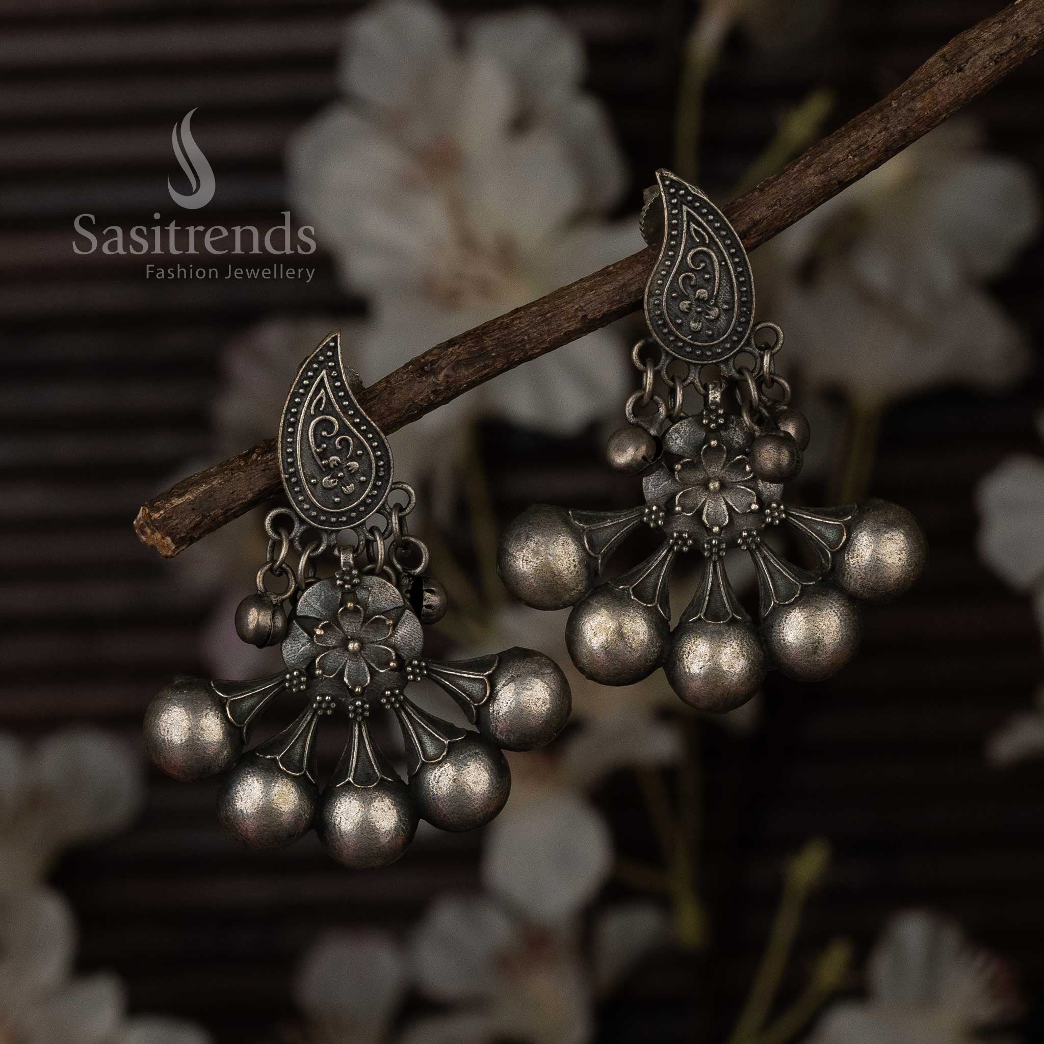 Oxidised silver Chandabali earrings with paisley motif for Navarathiri