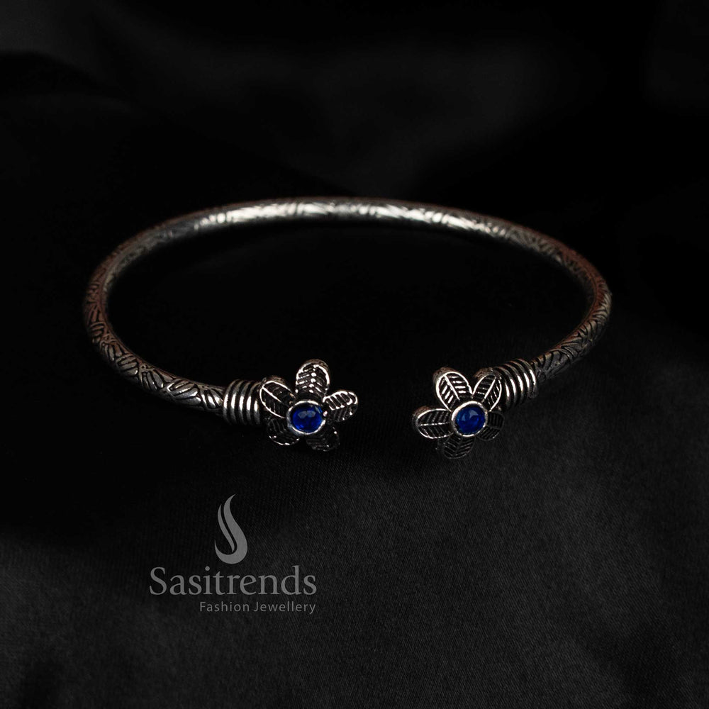 Sasitrends oxidised silver floral bracelet with single blue stone centerpiece, perfect for office style