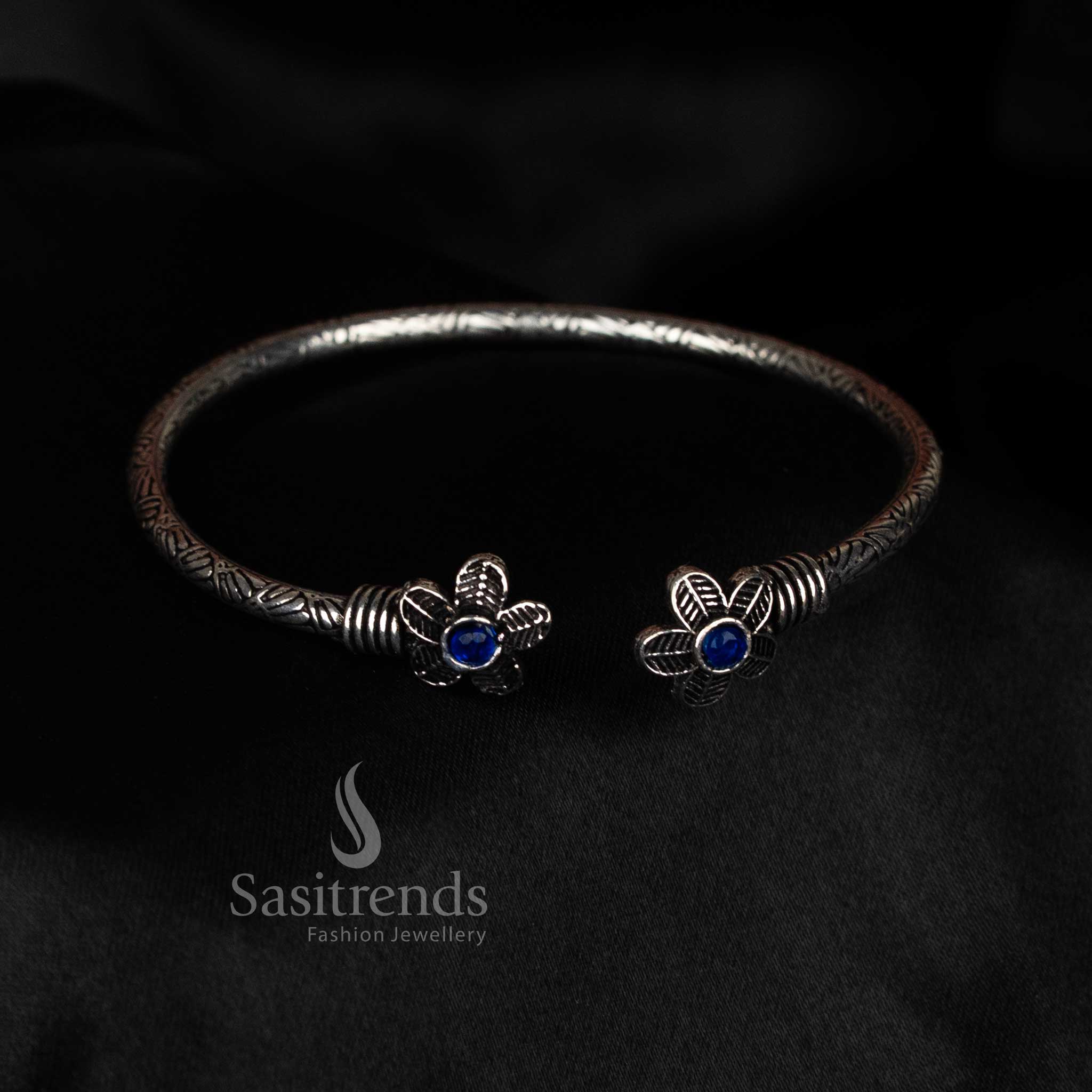 Sasitrends oxidised silver floral bracelet with single blue stone centerpiece, perfect for office style