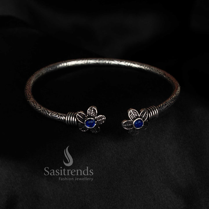 Sasitrends oxidised silver floral bracelet with single blue stone centerpiece, perfect for office style