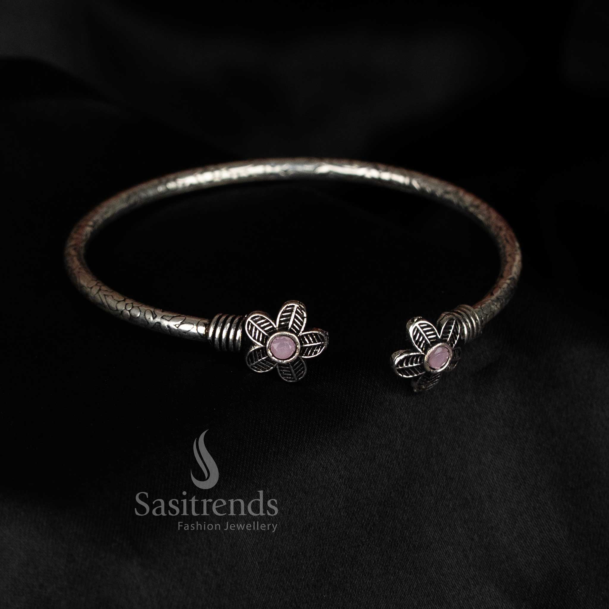 Traditional oxidised floral charm bracelet with pink stone accent by Sasitrends, Navaratri accessory