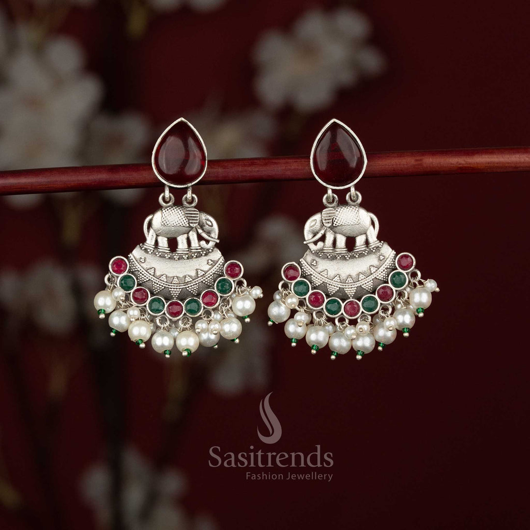 Oxidised elephant motif teardrop crescent earrings with stone and pearl accents - Sasitrends