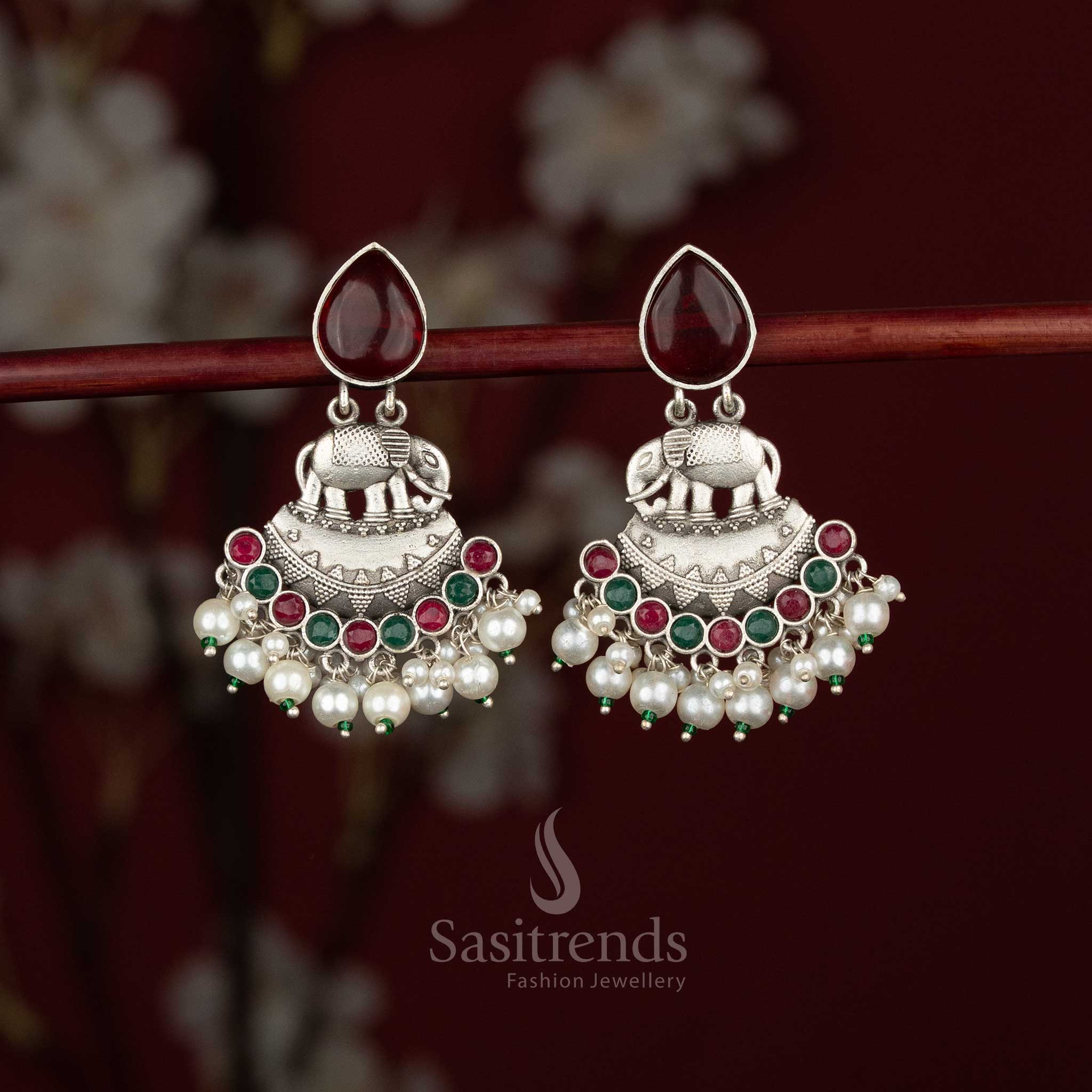 Oxidised elephant motif teardrop crescent earrings with stone and pearl accents - Sasitrends