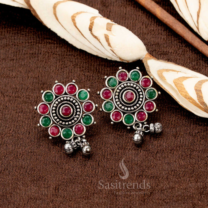 Ruby-green oxidised German silver earrings set featuring a bold floral pendant and layered ball chain lines, exuding vintage charm and bold ethnic style – statement fusion piece by Sasitrends
