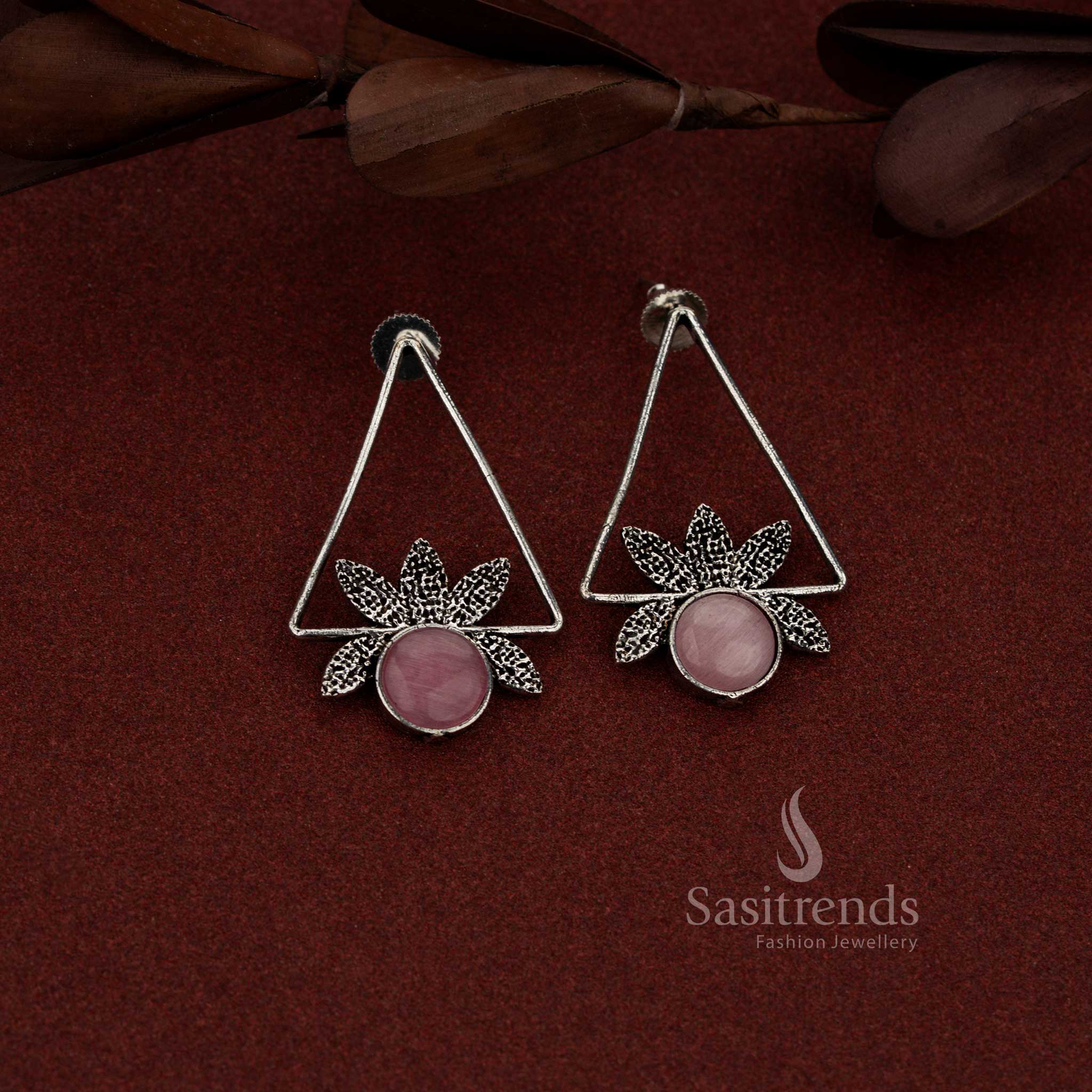 Oxidised isosceles triangle earrings with round pink stone detailing suitable for casual and evening wear