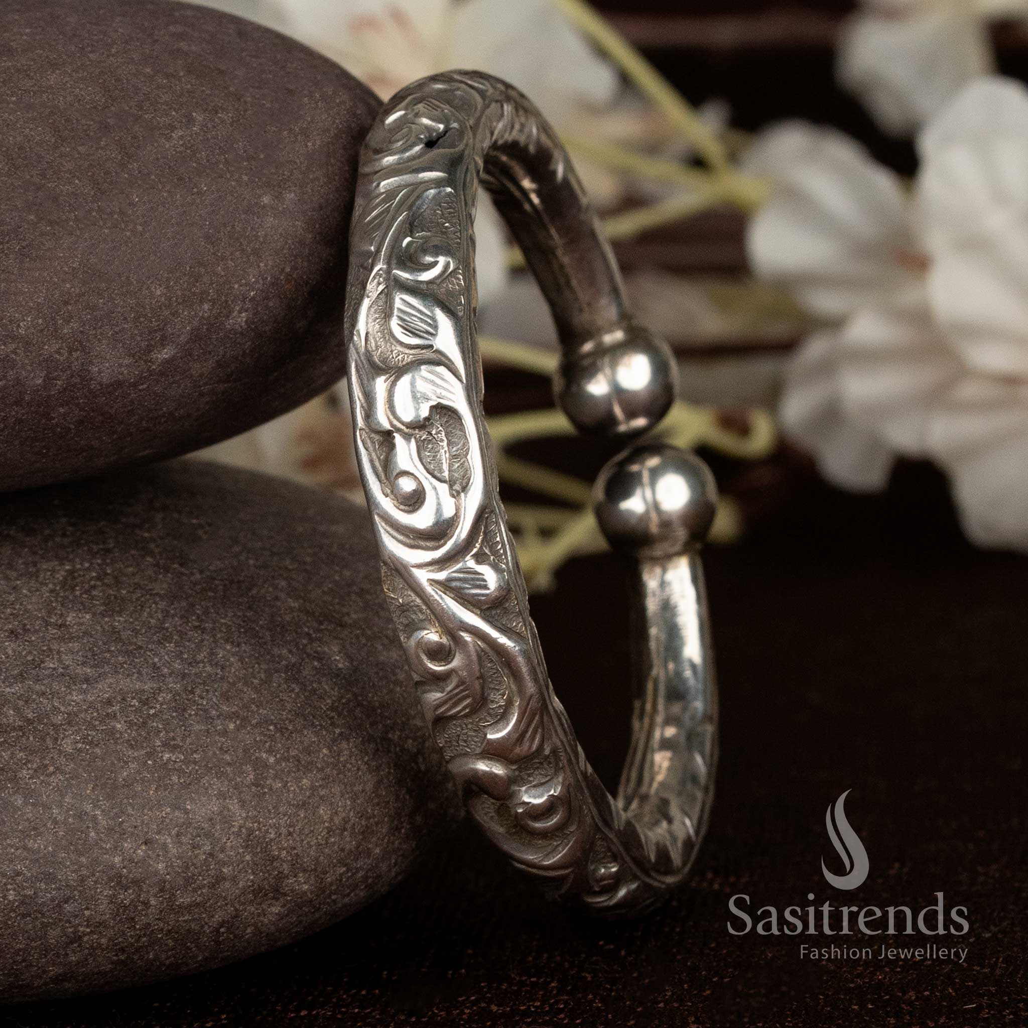 Elegant oxidised silver floral detailed kada bracelet featuring spherical finials, perfect for festive parties and traditional outfits – Sasitrends