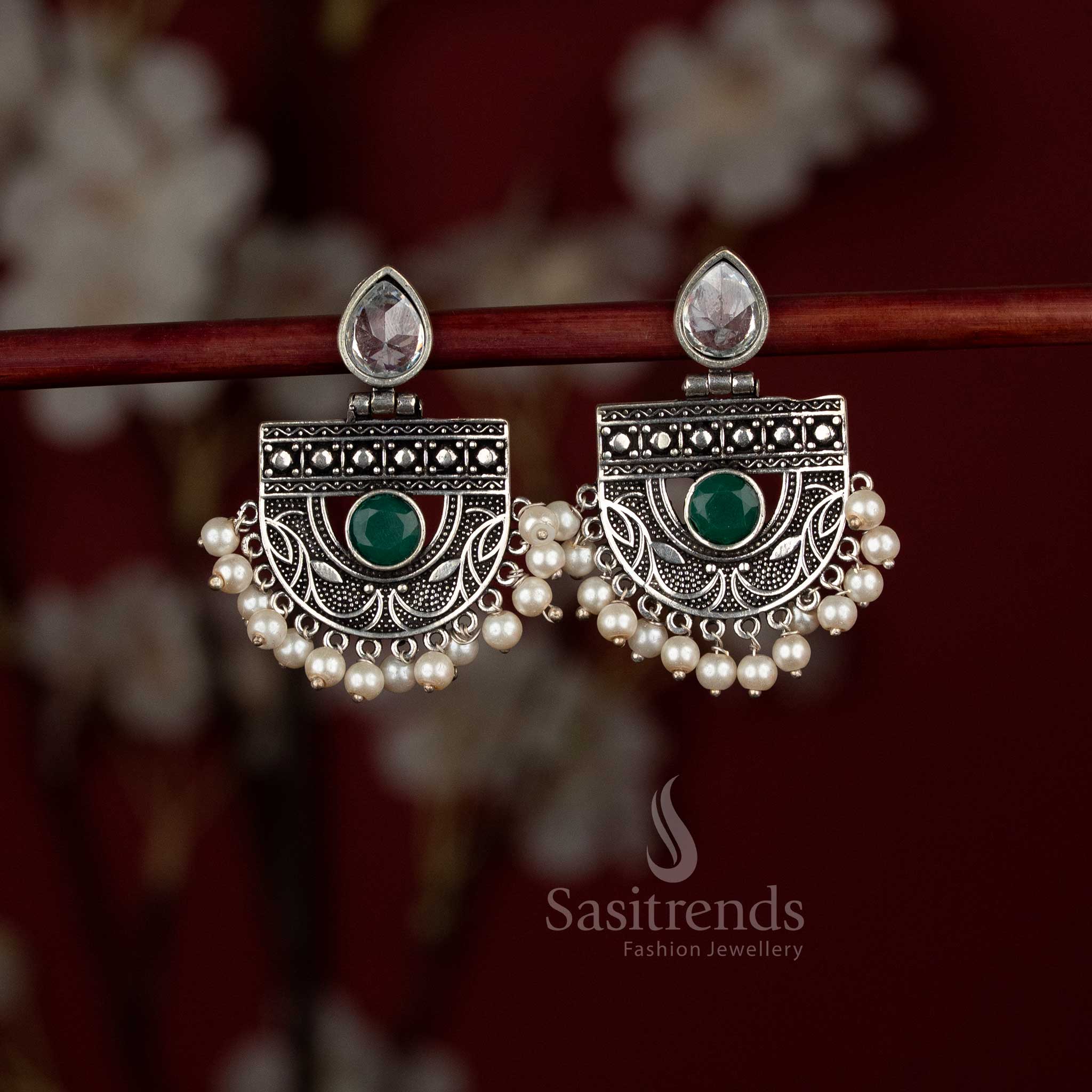 Crescent-style oxidised Chandbalis with pear stone and elegant pearl hangings - Sasitrends