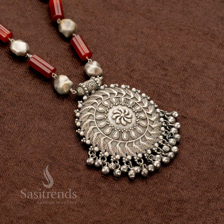Bold oxidised silver necklace jewellery set featuring a maroon floral round pendant and matching earrings—designed for temple-boho drama and vibrant Navaratri celebrations with ethnic flair - Sasitrends