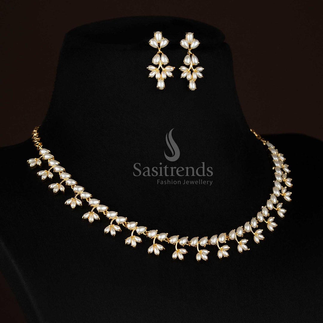 Party wear one gram micro gold plated american diamond pearl floral link ruby green necklace set by Sasitrends