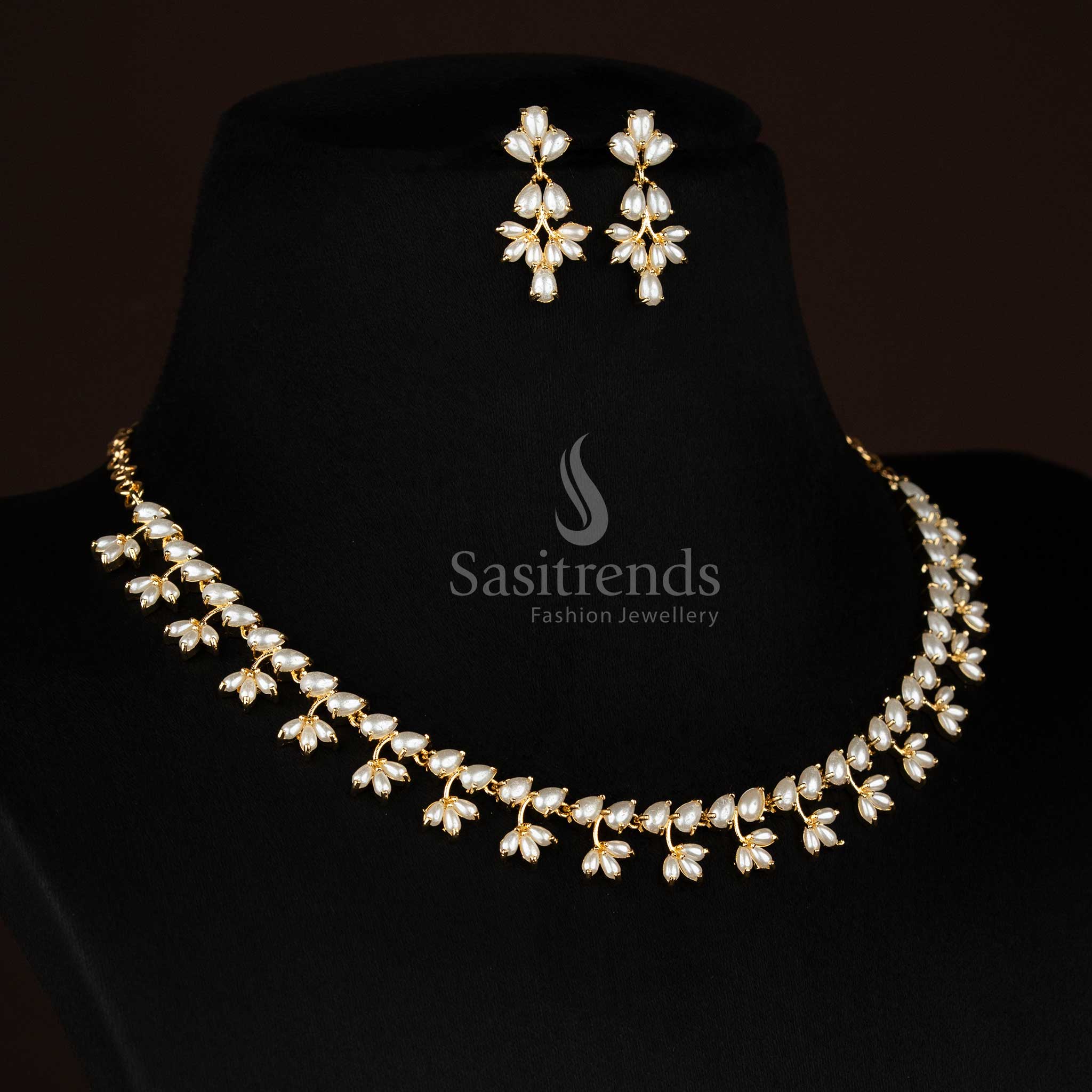 Party wear one gram micro gold plated american diamond pearl floral link ruby green necklace set by Sasitrends