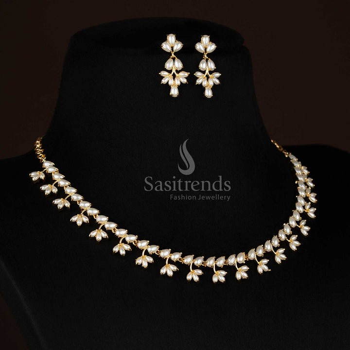 Party wear one gram micro gold plated american diamond pearl floral link ruby green necklace set by Sasitrends
