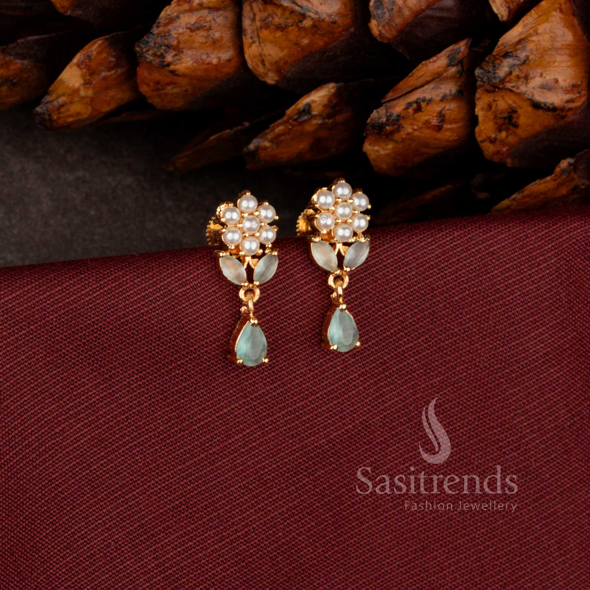 Sasitrends premium micro gold plated dangler earrings adorned with a brilliant teardrop AD stone stud and rich polished finish perfect for bridal and grand celebration wear.