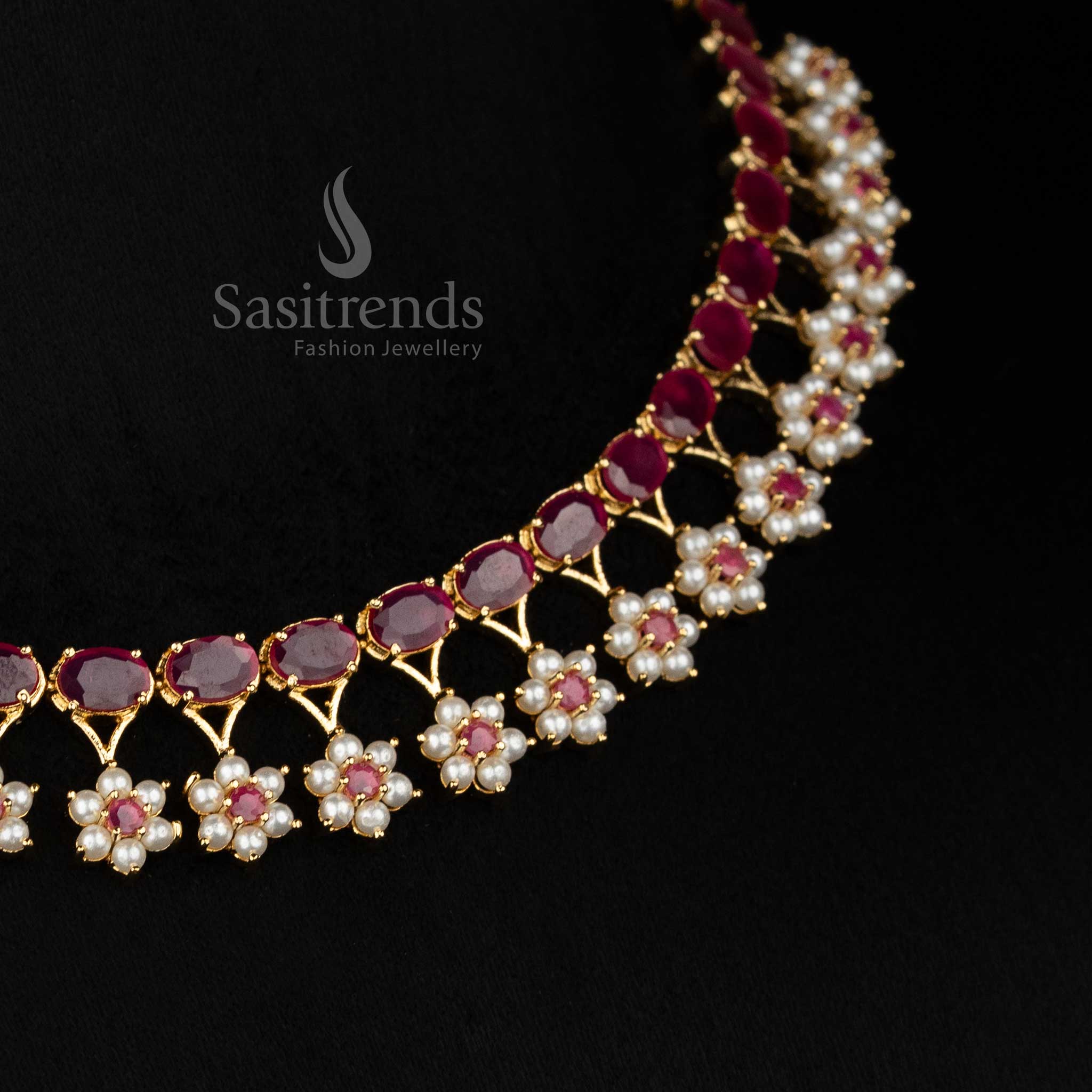 Elegant party wear one gram micro gold plated american diamond Floral pearl teardrop motif ruby green necklace set by Sasitrends