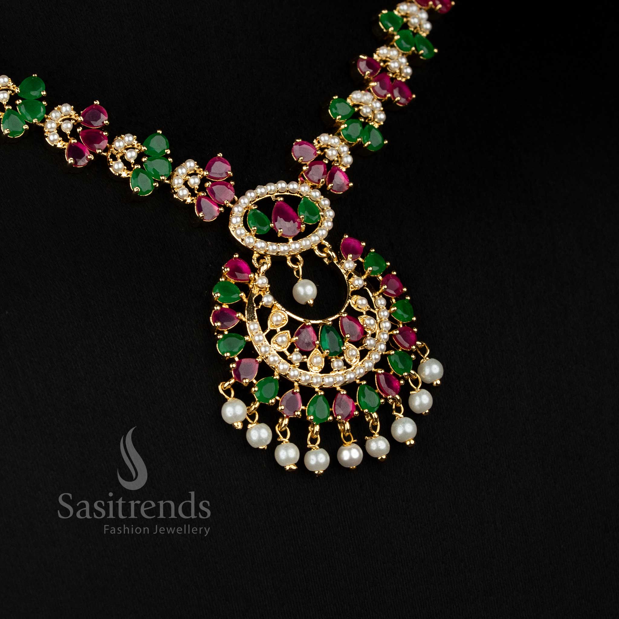 Party wear 24k micro gold plated american diamond pearl floral link ruby green necklace set chandabali pendant by Sasitrends