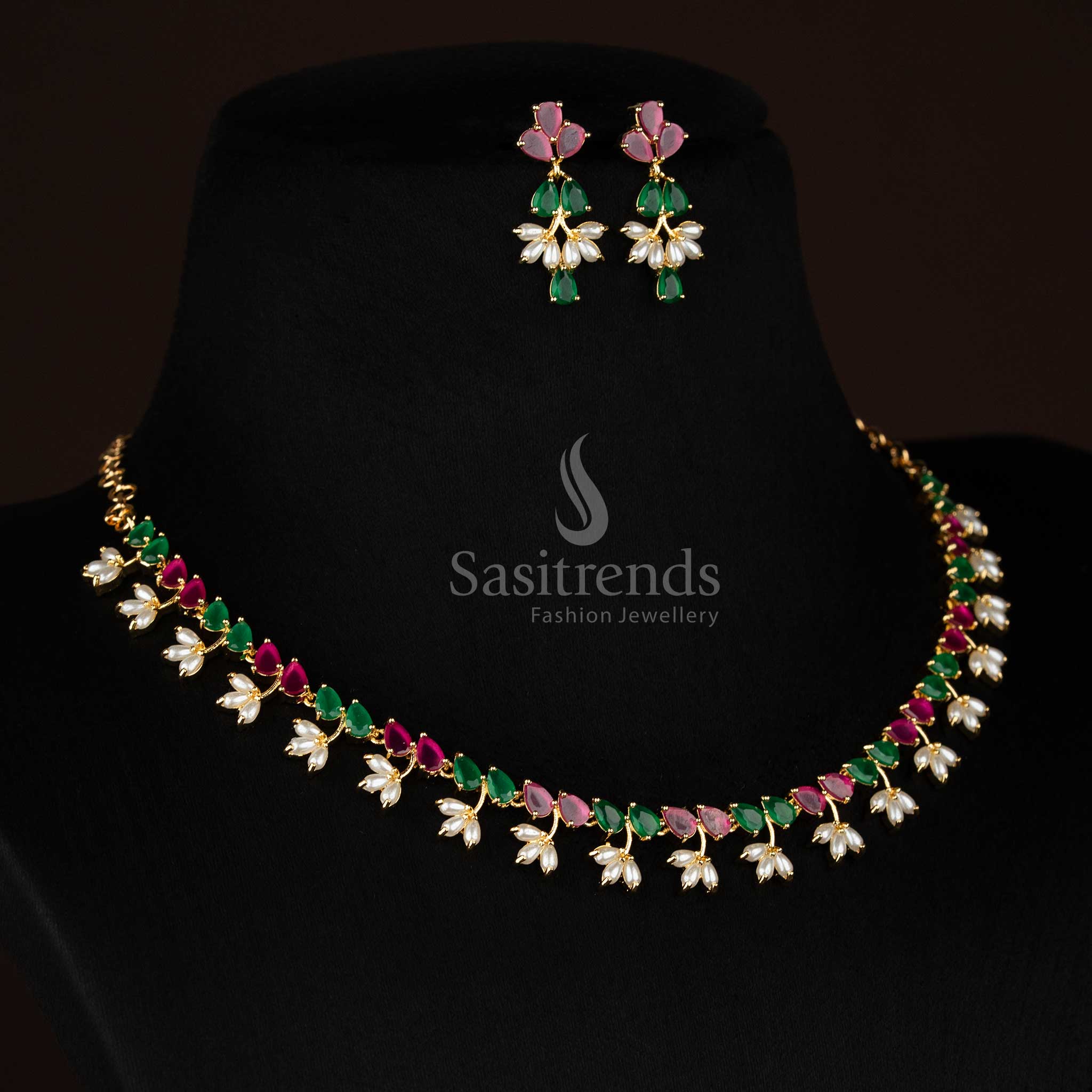 Party wear real gold look alike 24k micro gold plated american diamond pearl floral link ruby green necklace set by Sasitrends