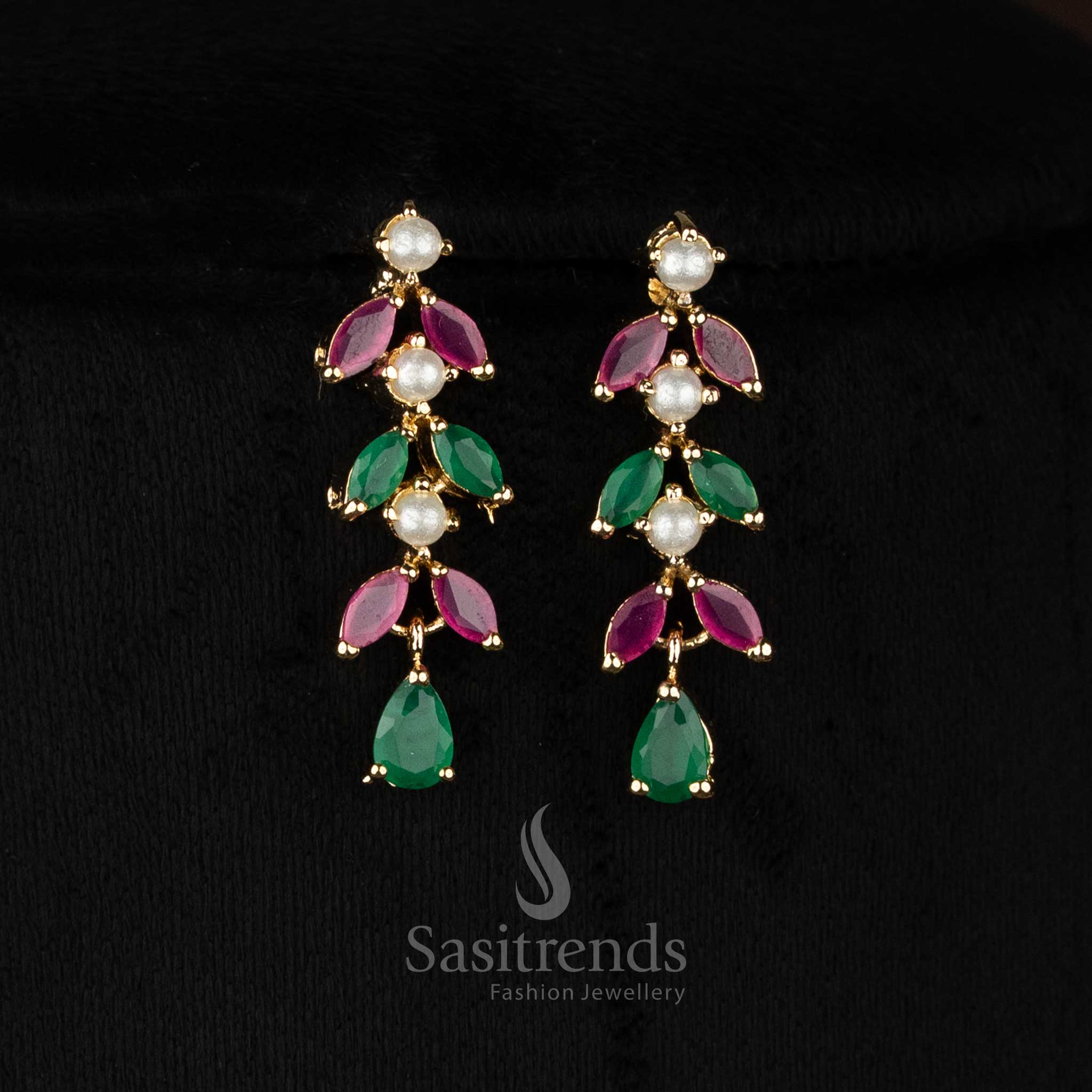 Sparkling one gram micro gold plated american diamond pearl leaf motif ruby green necklace set for wedding wear by Sasitrends