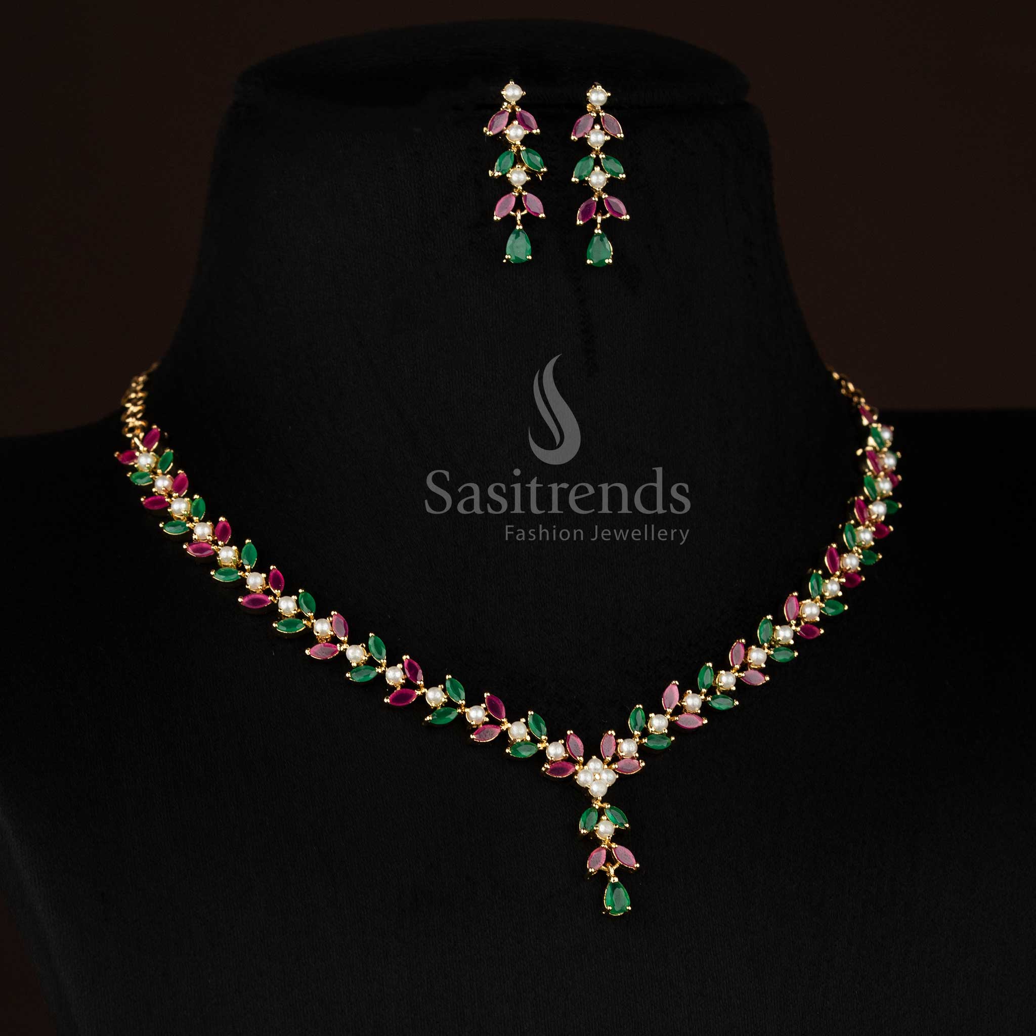 Guaranteed 24k micro gold plated american diamond pearl leaf motif ruby green necklace set by Sasitrends