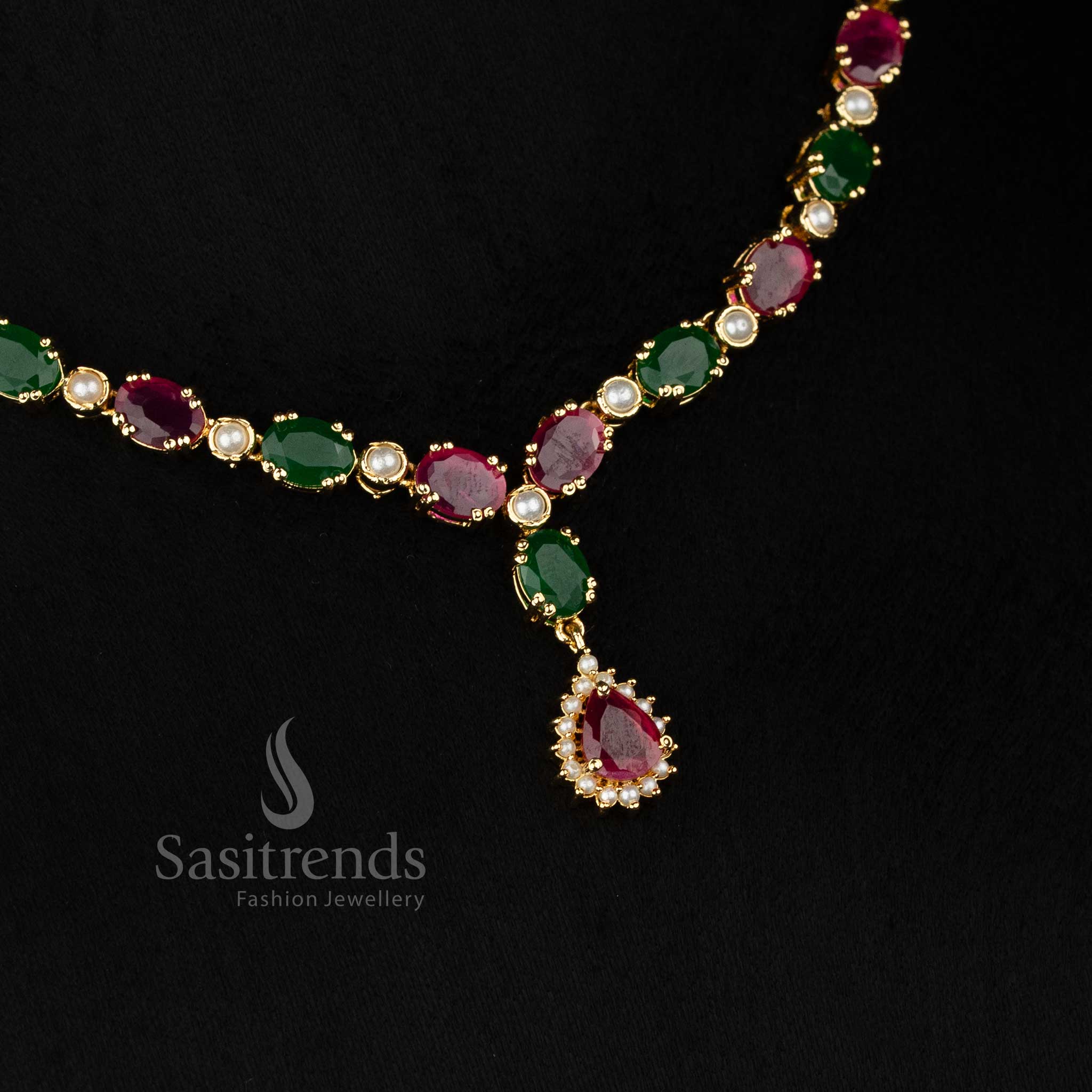 One gram festive wear micro gold plated american diamond pearl Oval Teardrop motif ruby green necklace set by Sasitrends