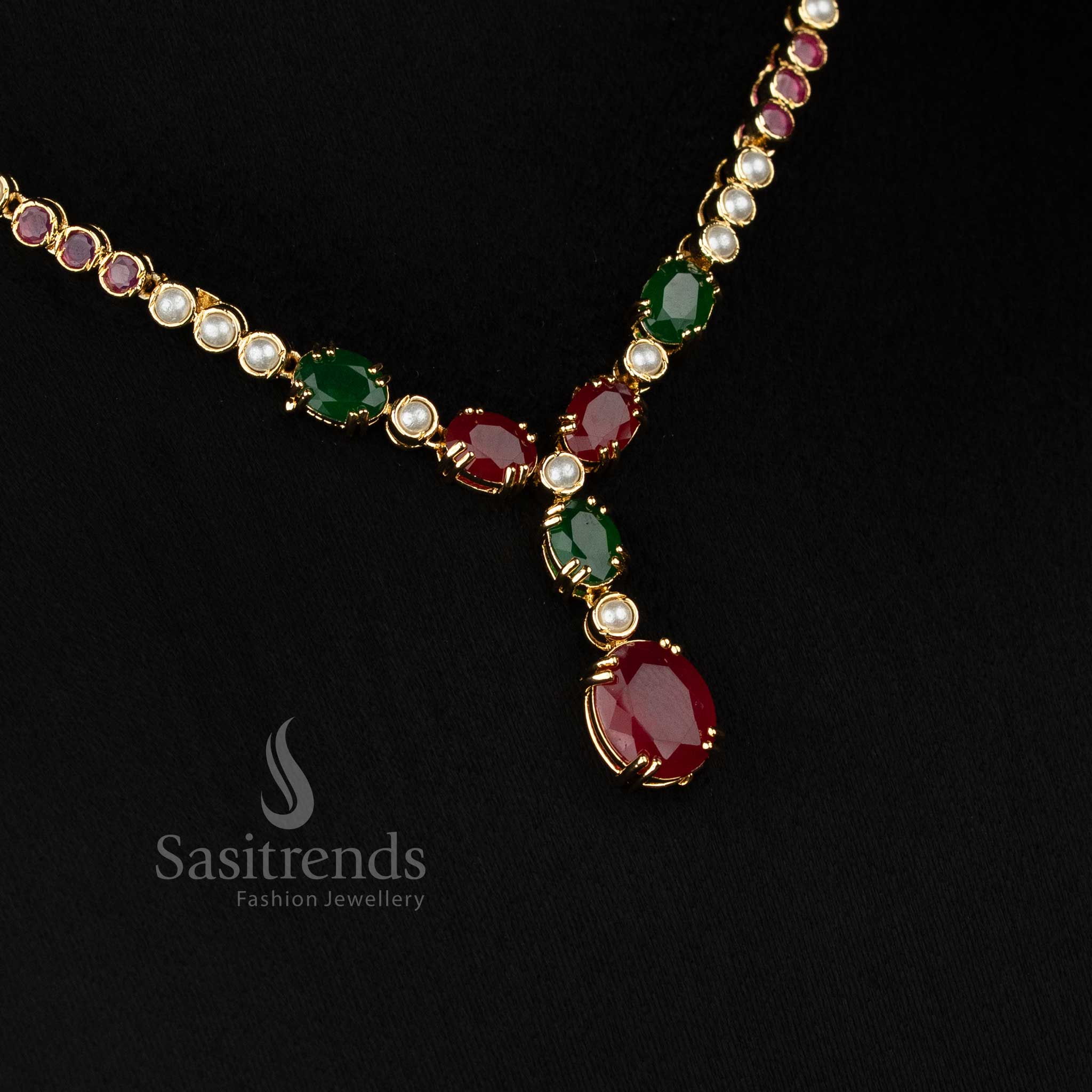 Wedding wear 24k micro gold plated american diamond pearl Round and Oval Teardrop motif ruby green necklace set by Sasitrends