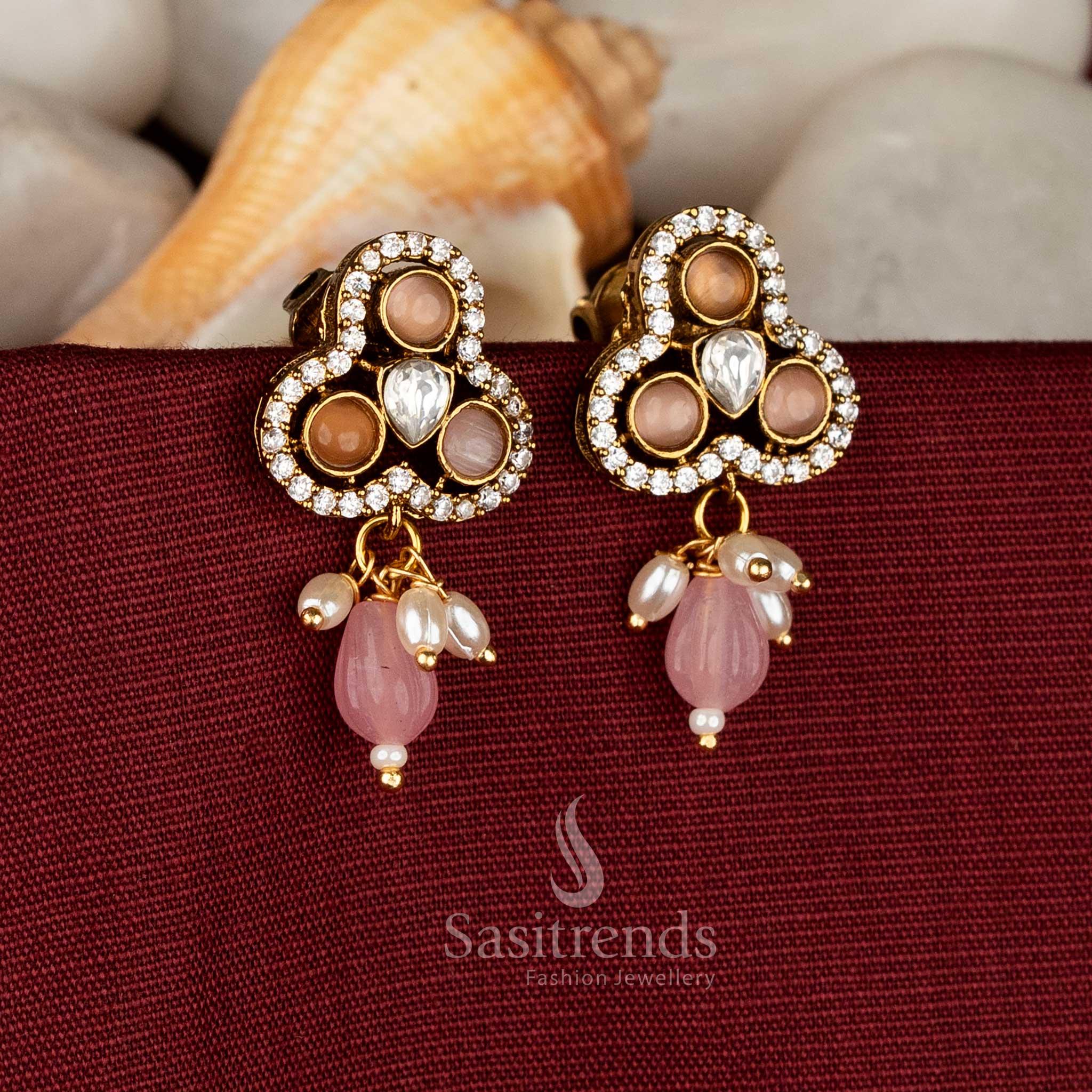 Bronze muse Victorian three-lobed studs decorated with warm pink AD accents and pearl drops for earthy ethnic glamour – Sasitrends