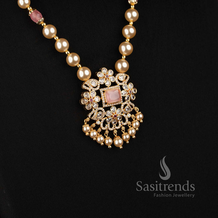 Micro Gold Plated American Diamond pearl strand necklace with ornate square pendant structure for party wear and receptions 