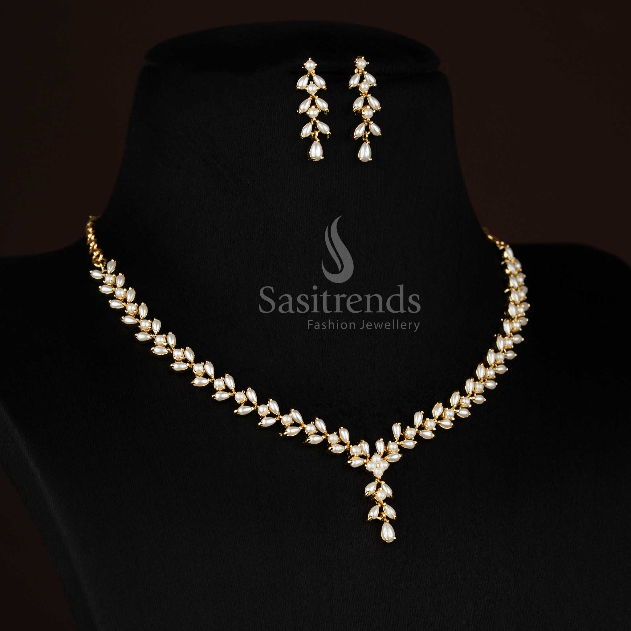 Traditional 24k micro gold plated pearl leaf motif necklace set by Sasitrends