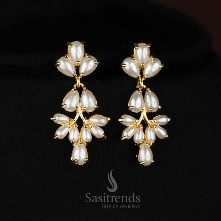 Party wear micro gold plated american diamond pearl floral link ruby green necklace set by Sasitrends