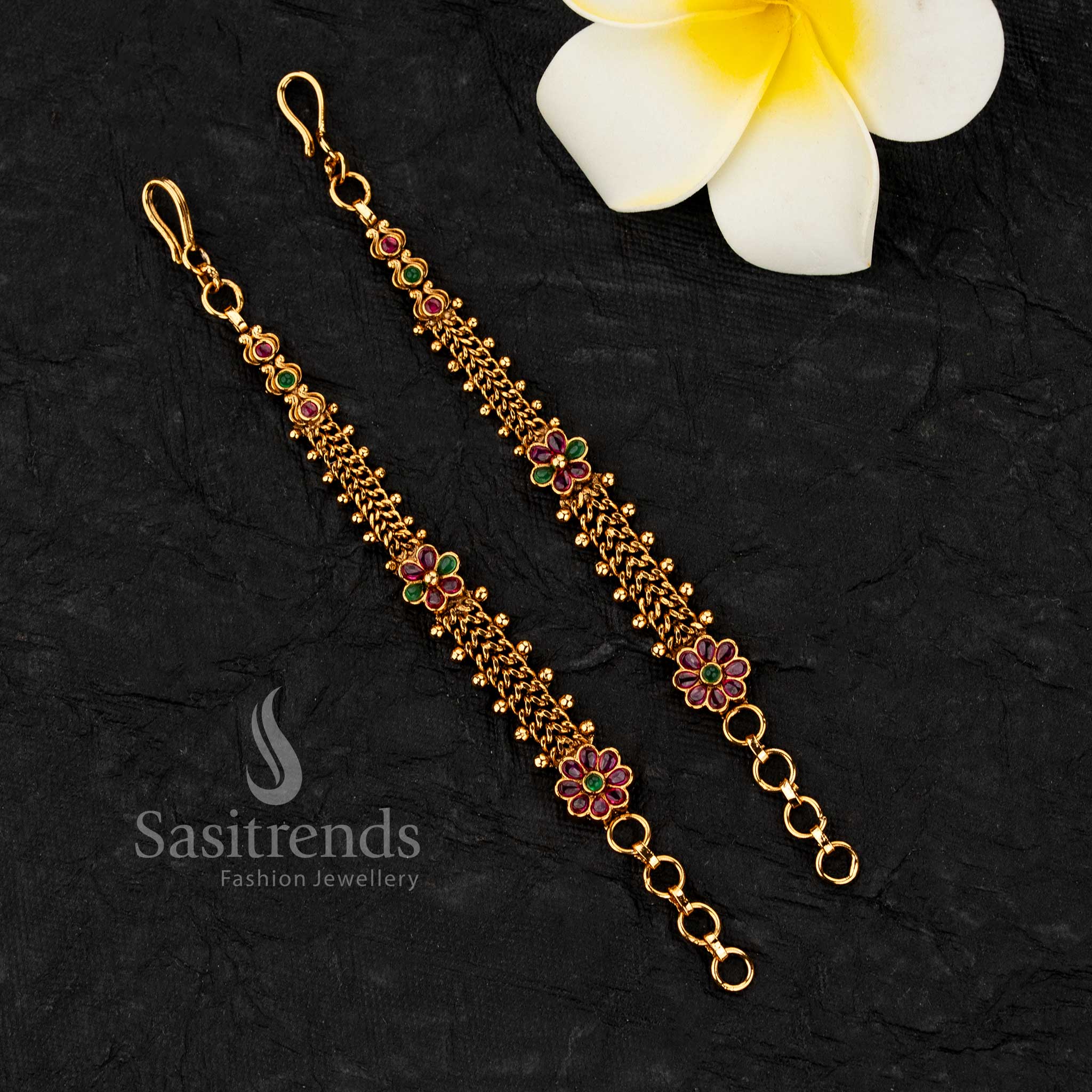 South indian style ear chains with floral patterns and layered chain structure crafted in matte gold plated finish for festive wear - Sasitrends