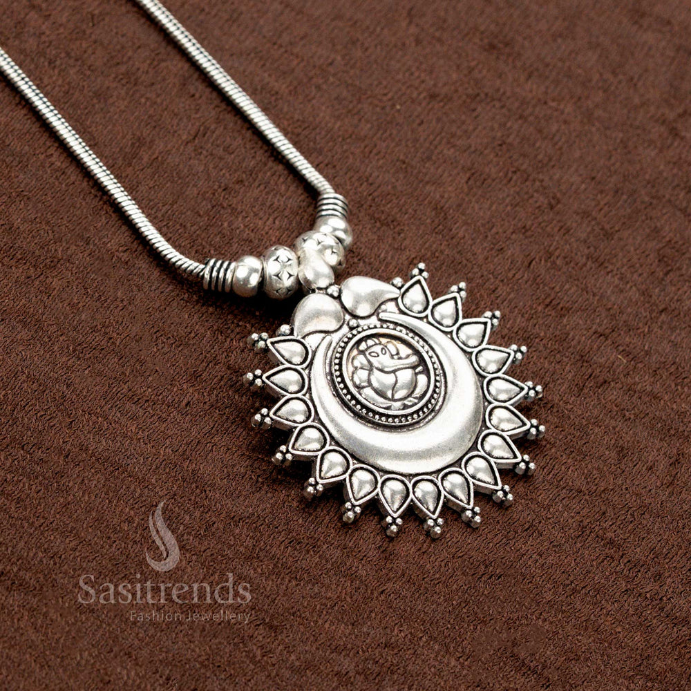 Mystic artisan-crafted oxidised silver chain necklace highlighting a full Ganesha pendant with celestial sun-moon motifs—an expressive Indian traditional jewellery creation - Sasitrends
