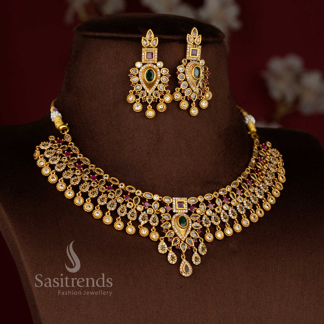 Latest bridal temple matte gold tone floral choker necklace jewellery set studded with sparkling American Diamond stones and matching earrings from SasiTrends